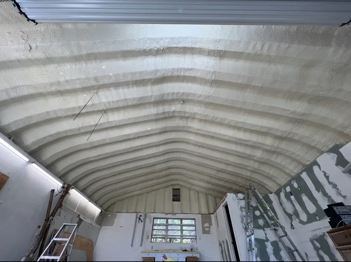 Spray polyurethane foam applied to the underside of a metal roof deck in Ladera Ranch